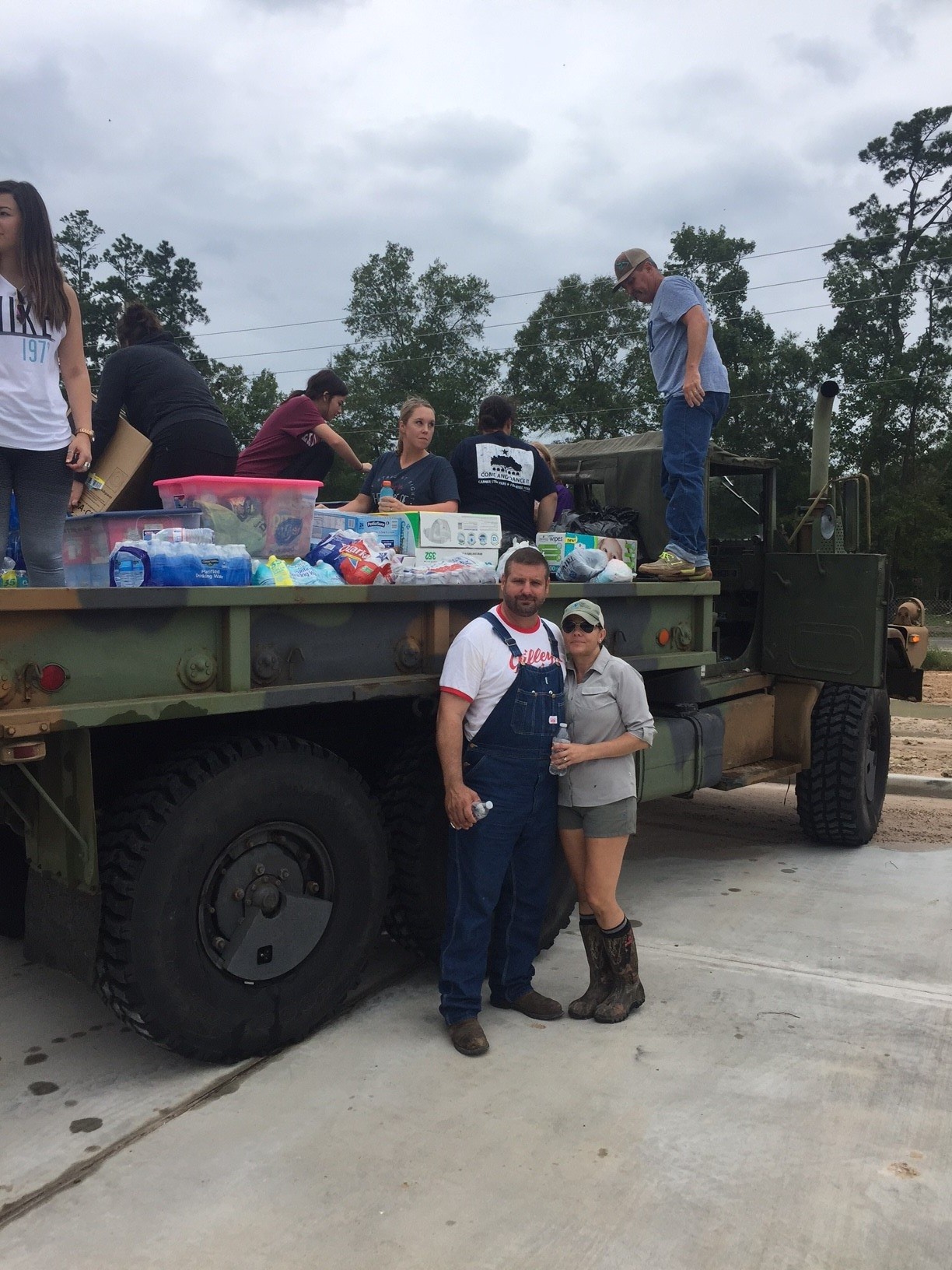   Tamara Perry and her husband Michael use their deuce and half to help transport food, supplies, and water into areas tha…