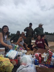  Volunteers and the Texas Rangers are transported along with food and supplies into areas land locked by flooding waters.